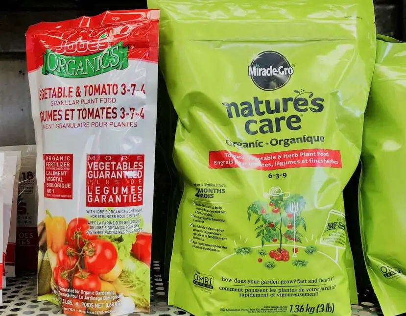 Two bags of Miracle-Gro Nature's Care Organic Bone Meal fertilizer.